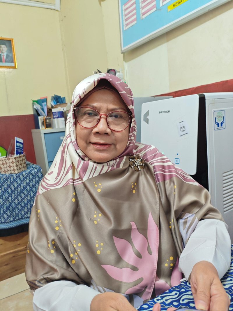 Hj Kuswati,S.Pd.I